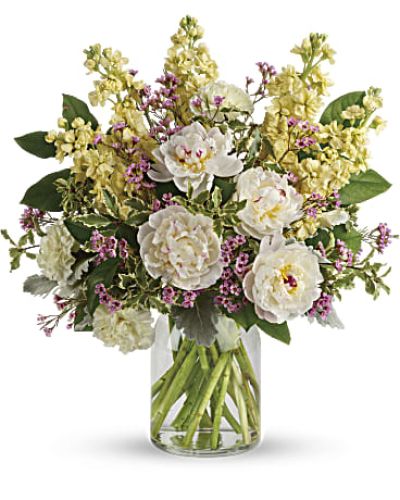 <div id="mark-3" class="m-pdp-tabs-marketing-description">Chic and serene, this dreamy bouquet of wondrous white peonies and creamy blooms in a milk jug vase sends your very best wishes for a stylish spring!</div>
 
<div id="desc-3">
<ul>
 	<li>This serene arrangement features white peonies, light yellow carnations, light yellow stock, lavender waxflower, dusty miller, pitta negra, and lemon leaf.</li>
 	<li>Delivered in a clear glass vase.</li>
</ul>
</div>