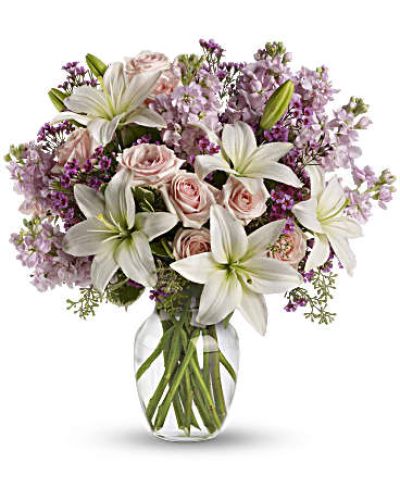 <div id="mark-3" class="m-pdp-tabs-marketing-description">Put your love into the season's most romantic flowers - light pink roses, fragrant white asiatic lilies and other favorites in a dazzling clear glass vase. Love will blossom in the most intoxicating way for a full week. You'll both enjoy it.</div>
 
<div id="desc-3">
<ul>
 	<li>This spectacular bouquet includes light pink spray roses, white asiatic lilies, lavender stock and lavender waxflower accented with assorted greenery.</li>
</ul>
</div>
