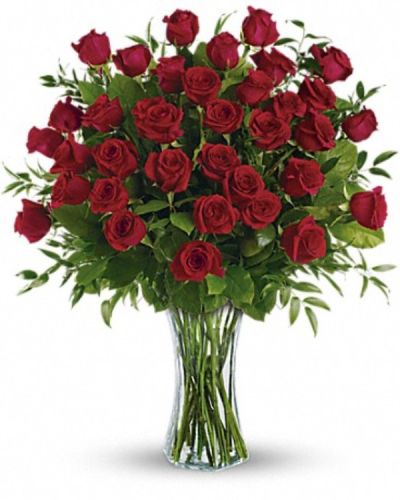 <div class="m-pdp-tabs-description">
<div id="mark-1" class="m-pdp-tabs-marketing-description">

One, two, three! Three dozen spectacularly gorgeous red roses delivered in a dazzling flared glass vase - positive proof that love is a many-splendored thing. Imagine her loving this amazing bouquet day after day. Hero-worshipping time.

</div>
</div>
This impressive bouquet includes 36 red roses accented with assorted greenery. Delivered in a flared glass vase.

<hr />

 